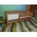 Детская односпальная кровать "Малыш-2" c бортиком